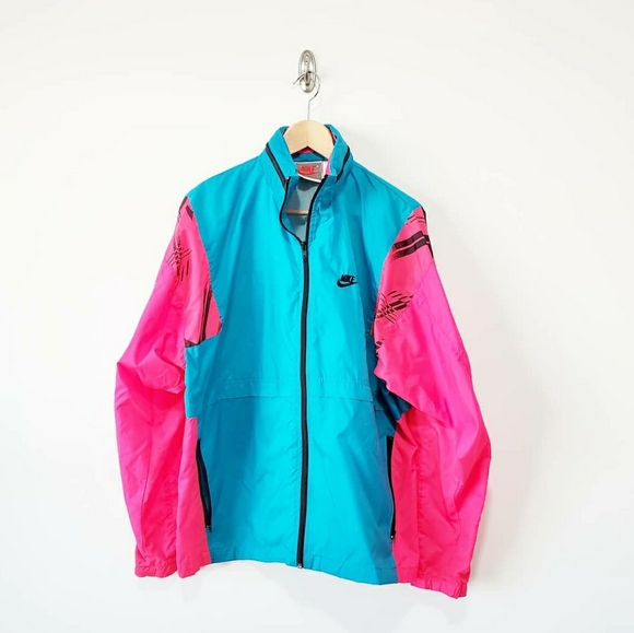 Nike Other - Vintage Nike Windbreaker with hood and arm pocket